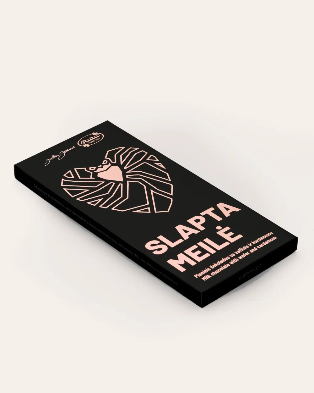 Black packaging of “Slapta meilė” milk chocolate with wafers and cardamom with a heart drawing, side view