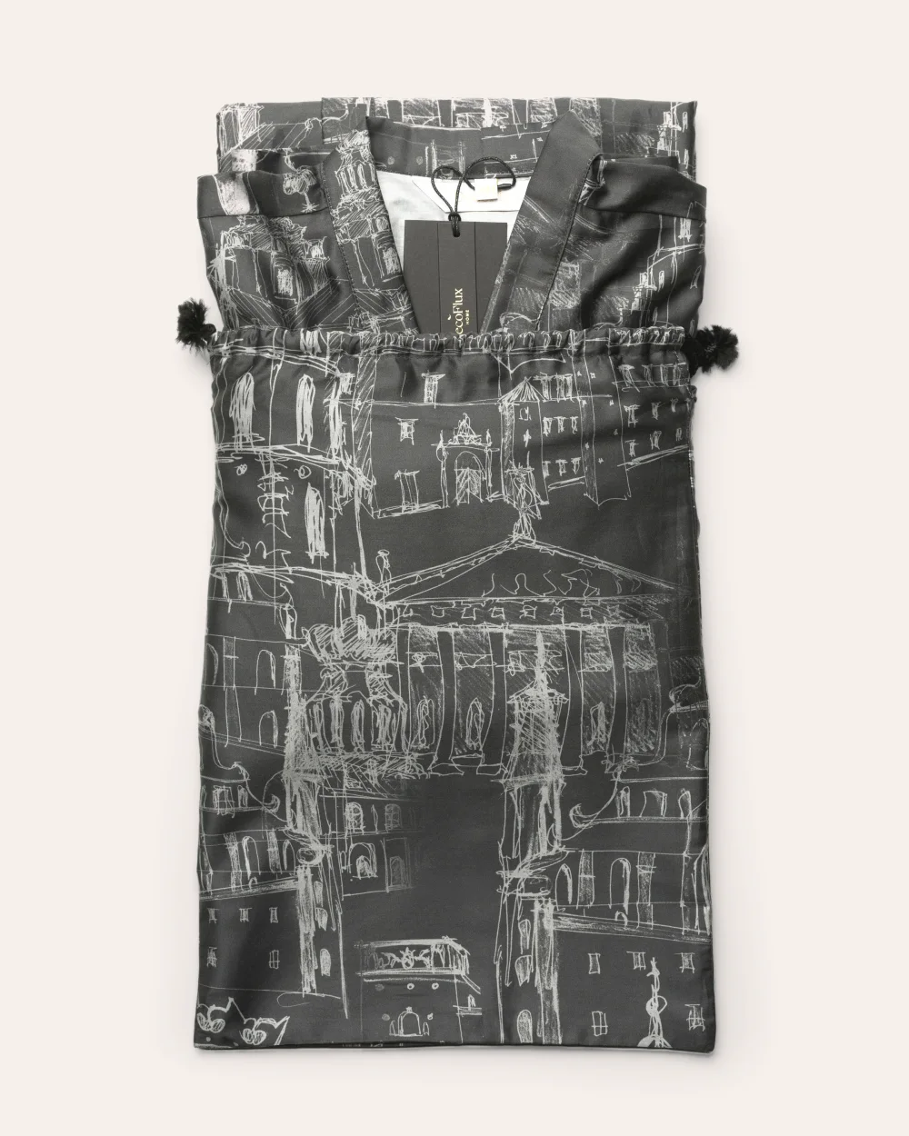 A folded anthracite “Royal Vilnius Love Story” kimono robe on a drawstring bag