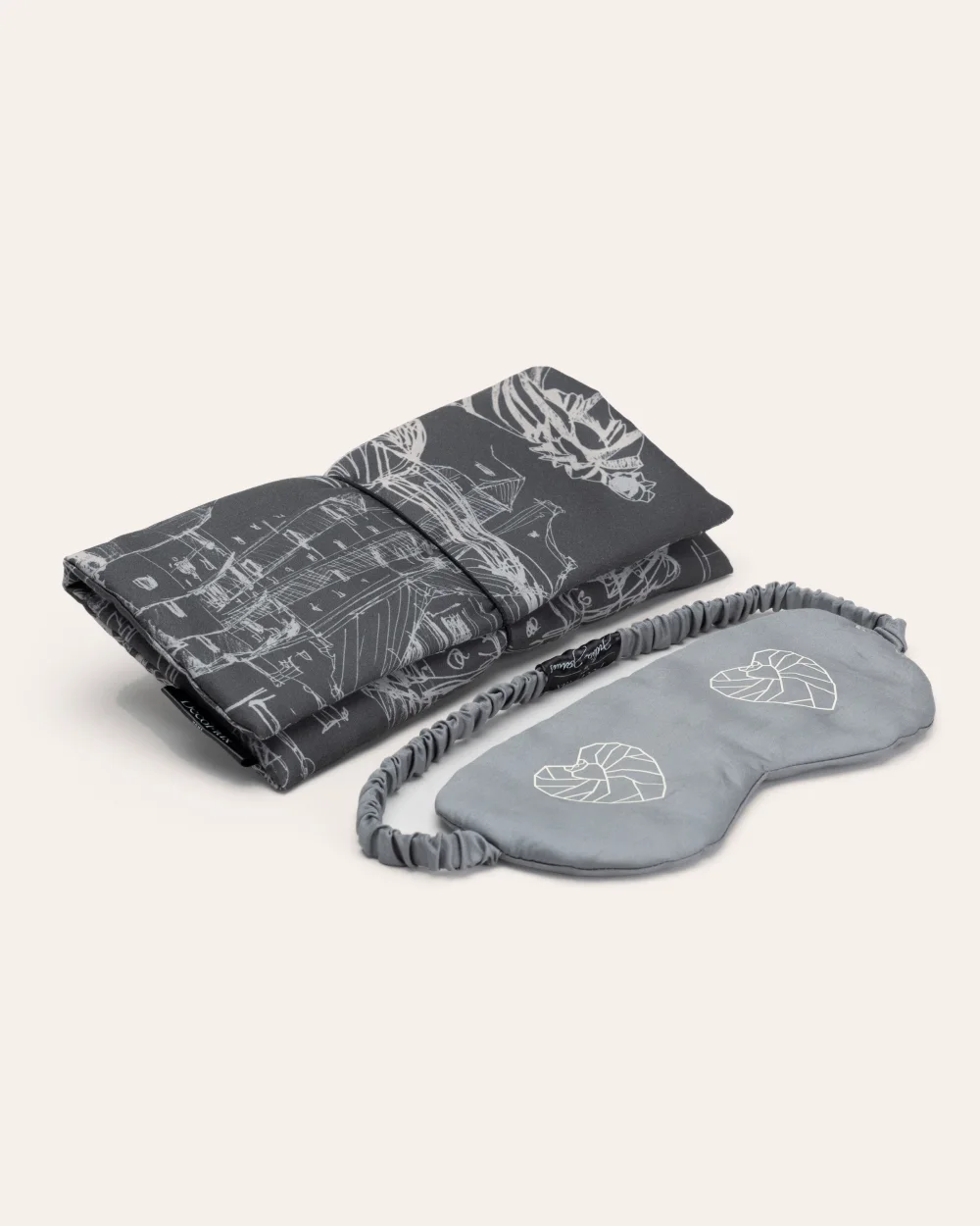 Grey “Royal Vilnius Love Story” sleep mask and a dark case with a Vilnius drawing