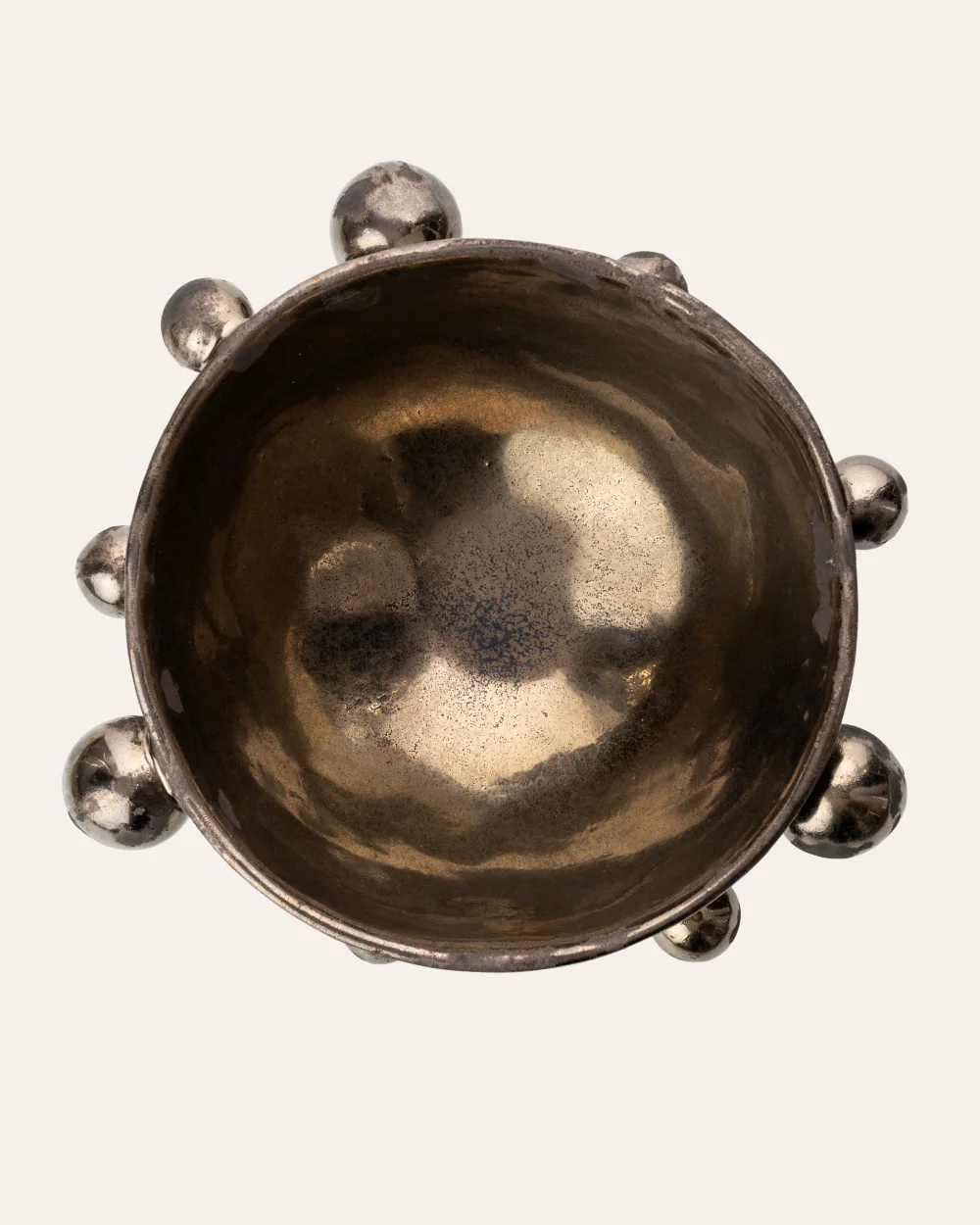 Medium dark gold “The Queen's Pearl Bowl” from above, showing the glossy inside