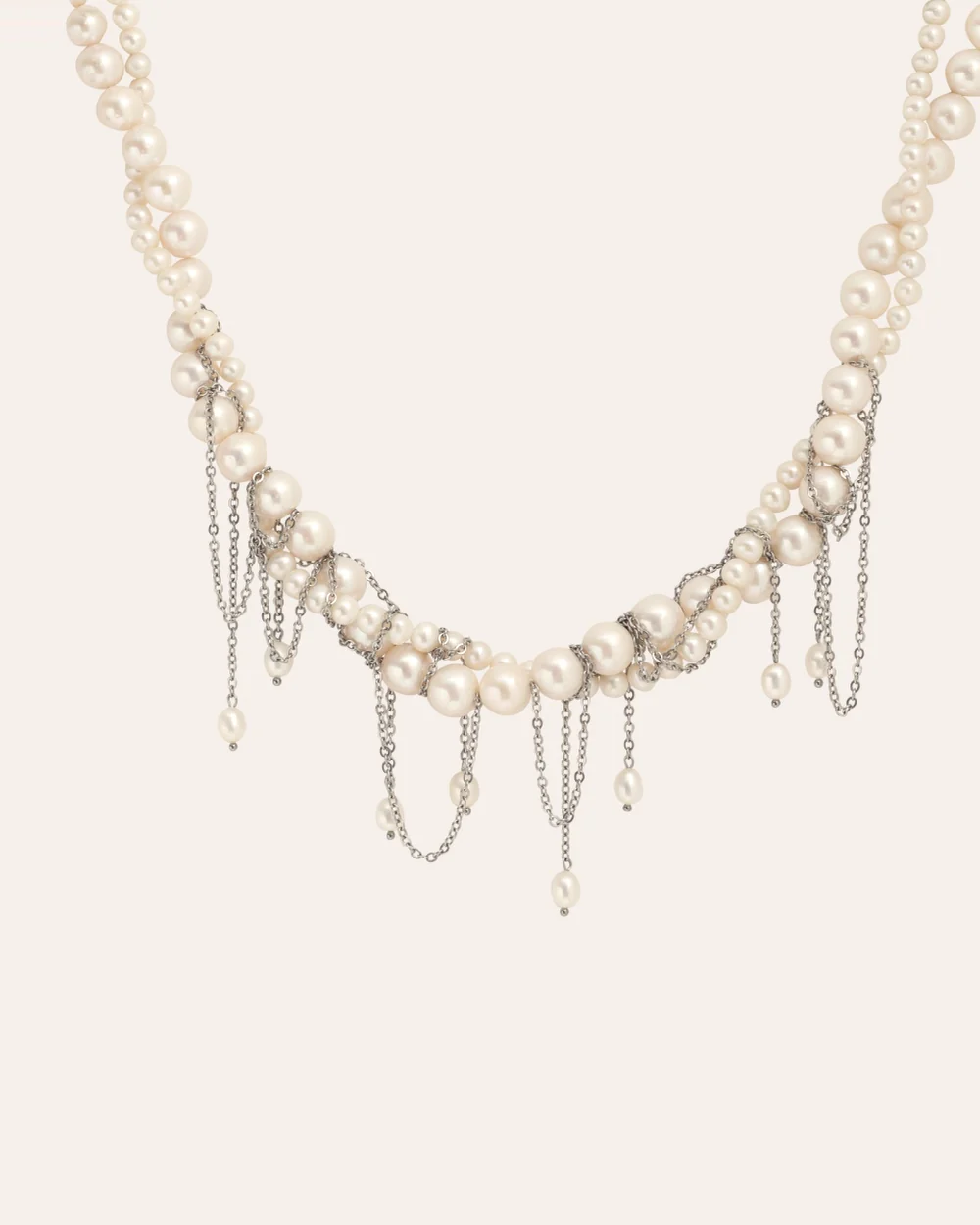 “The Queen's Whim” necklace with pearls and hanging chains, close-up