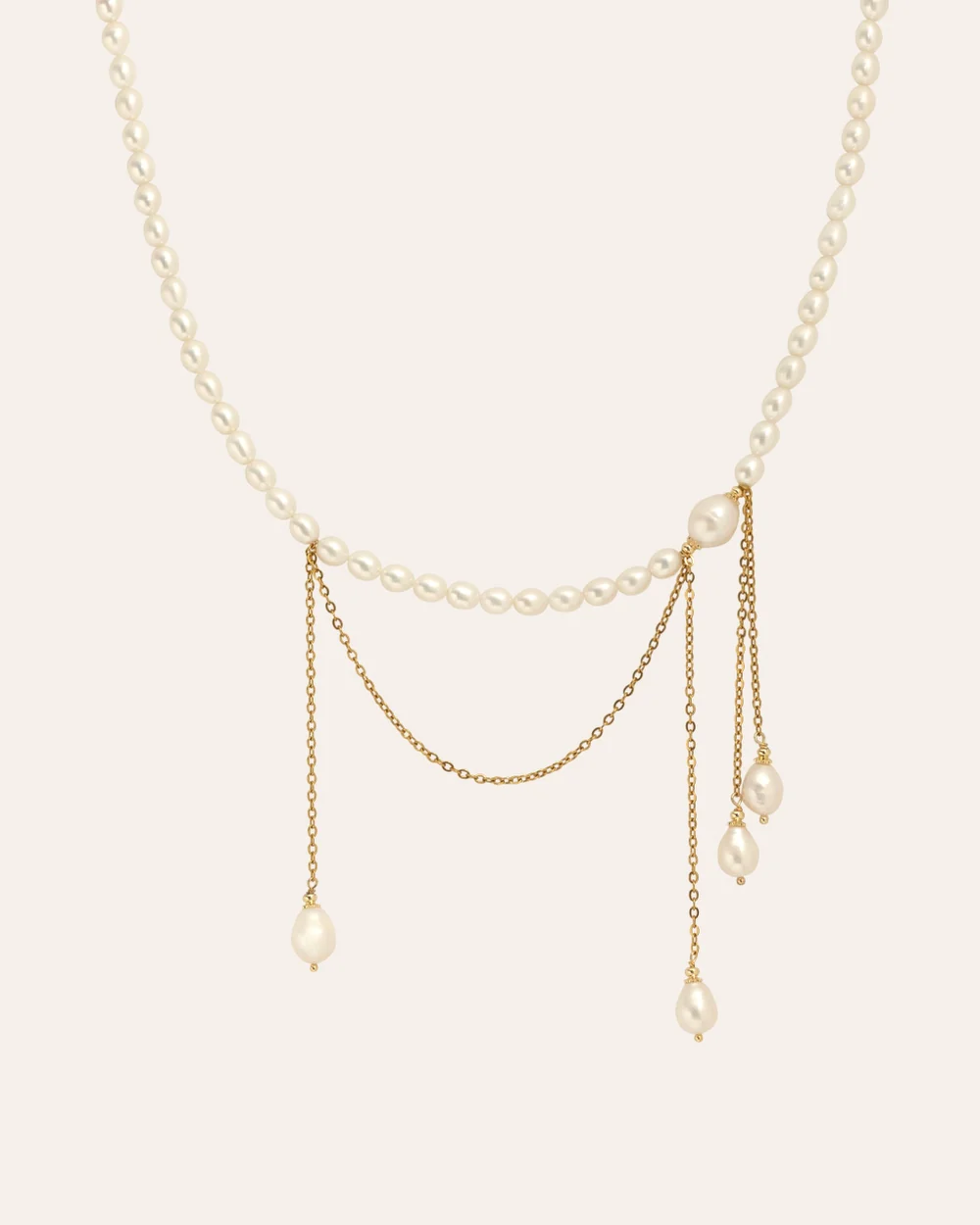 “In the Queen's Name” necklace – a pearl strand with gold chains and pearl drops