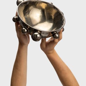 Dark gold “The Queen's Pearl Bowl” with beads, raised in two hands