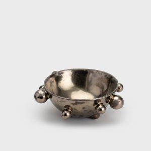 Medium dark gold “The Queen's Pearl Bowl” with beads on a light background
