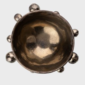 Medium dark gold “The Queen's Pearl Bowl” from above, showing the glossy inside