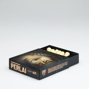 Open box of “Queen Barbara's Pearls” hazelnuts in white chocolate