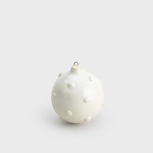 White pearl-coloured Christmas ornament “Royal Pearl” on a light background