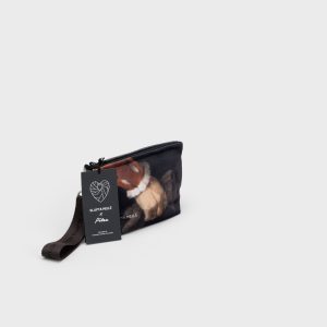 Smallest “Augustus” cosmetic bag with a painting image and a hang tag on a light background
