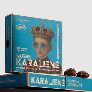 Box of “Queen Catherine Jagiellon” sweets with a portrait, and sweets on a black shelf