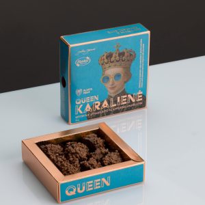 Upright box of “Queen Catherine Jagiellon” sweets and an open tray of sweets