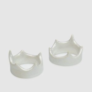 Two pearl crown-shaped holders “Vilnius Crown” on a light background
