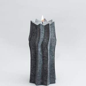 Anthracite ribbed candle “King Sigismund Augustus” on a light background