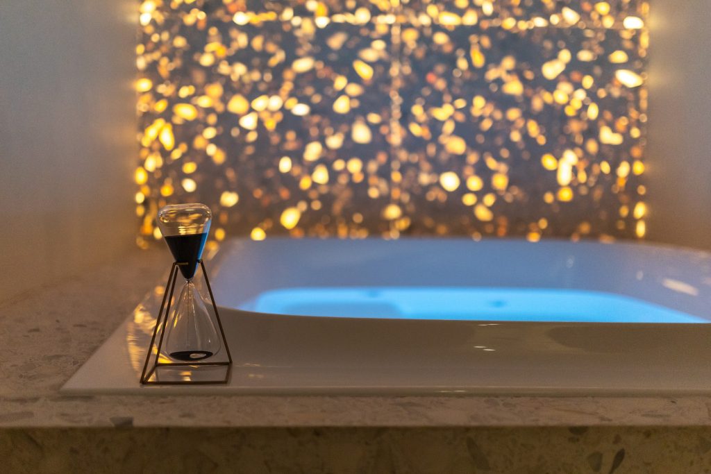 A whirlpool bath with blue lighting and small lights in a SPA area – “Queen Barbara's Pearls”