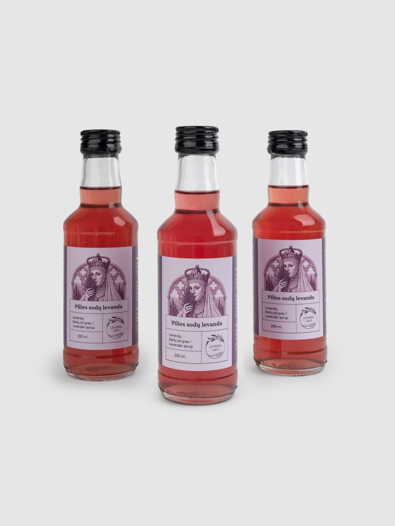 Three bottles of “Castle Gardens Lavender” lavender flower syrup with purple labels