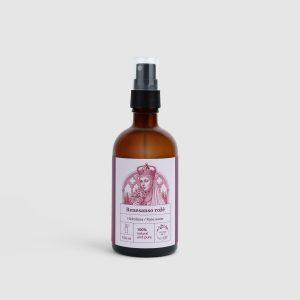 “Renaissance Rose” rose hydrosol in a brown spray bottle with a pink label