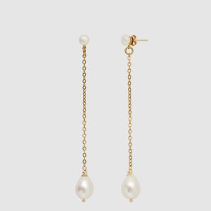 Gold earrings “The Queen's Pearl” with a long chain and a teardrop pearl on a light background