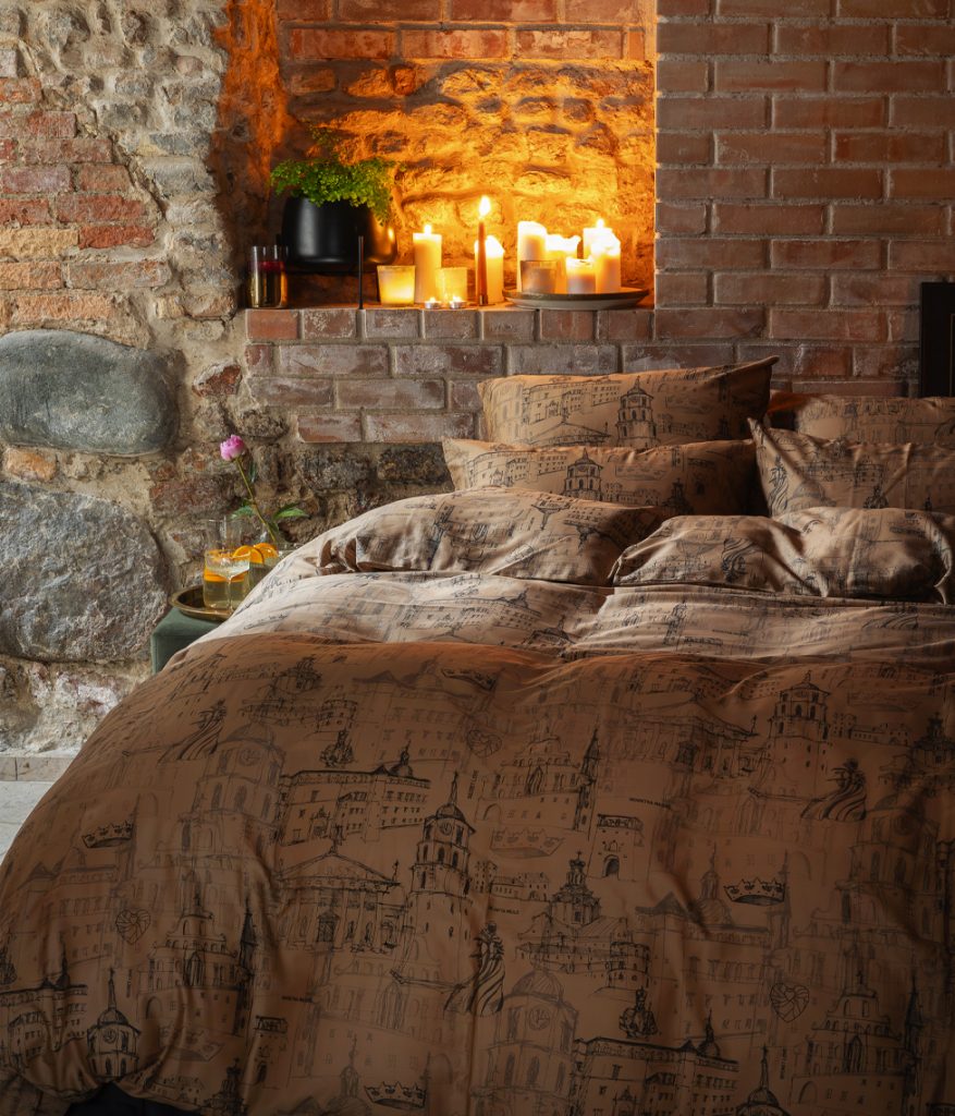 Cinnamon satin bedding “Royal Vilnius Love Story” with a drawing of Vilnius buildings in an interior