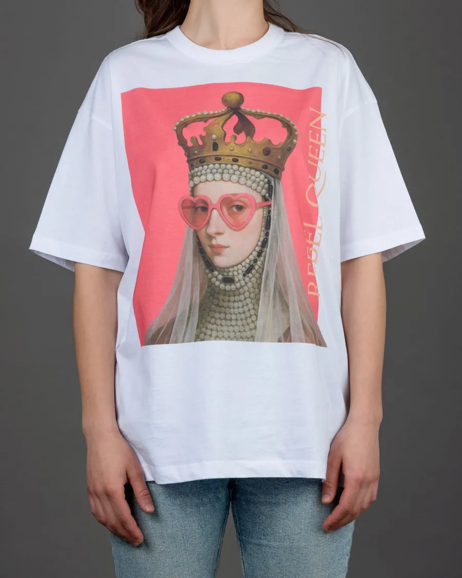 Woman in a white “REBEL QUEEN” T-shirt, closer front view