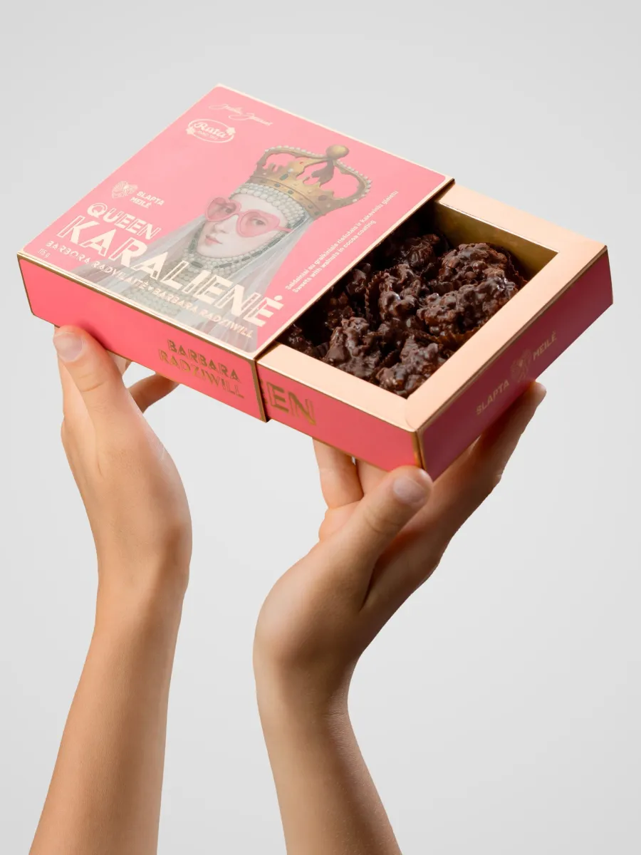 Open box of “Queen Barbara Radziwiłł” chocolate sweets in hands