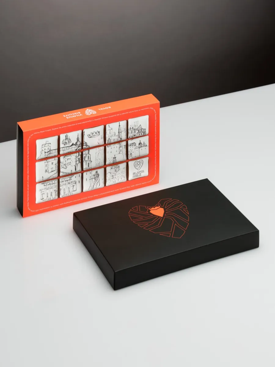 Orange box of decorated “Royal Vilnius” gingerbread and a closed black box with a heart