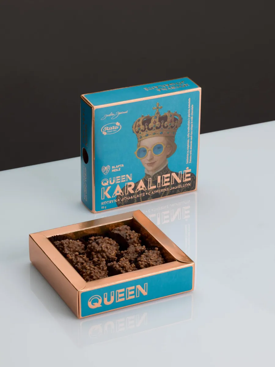 Upright box of “Queen Catherine Jagiellon” sweets and an open tray of sweets
