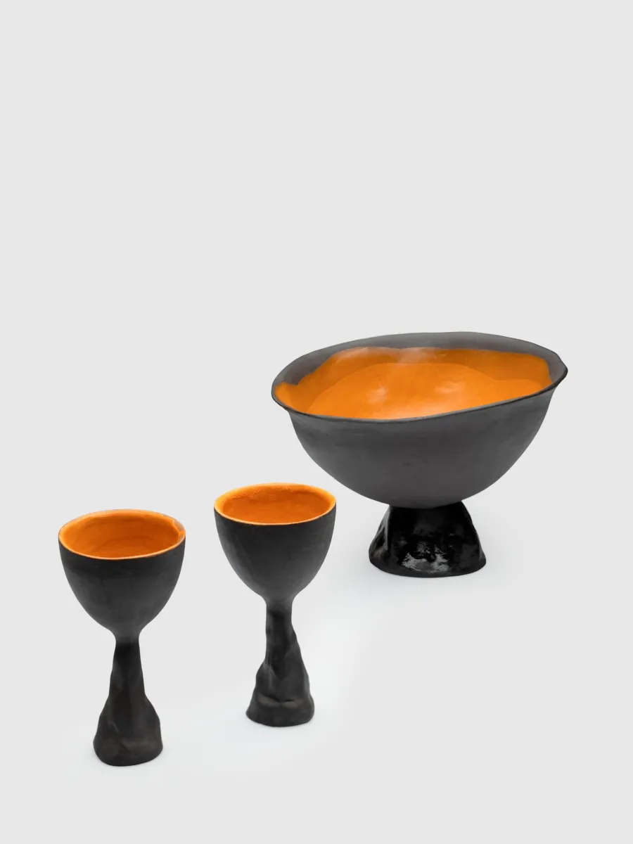 Two black Kings' Goblets next to the Kings' Footed Bowl on a light background