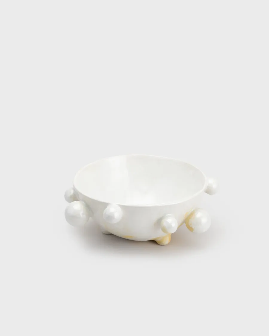 Medium pearl white “The Queen's Pearl Bowl” with beads on a light background