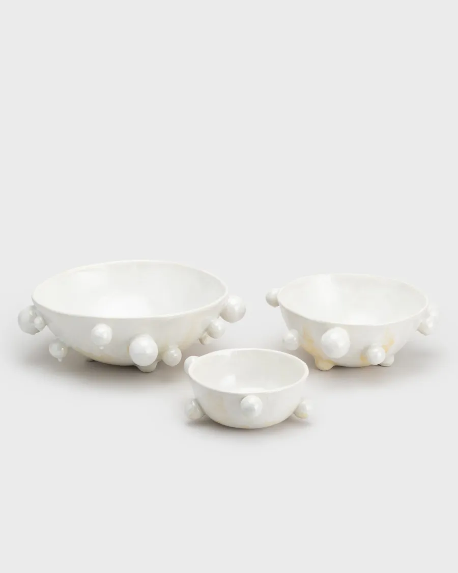 Three pearl white “The Queen's Pearl Bowl” bowls in different sizes, angled view from above