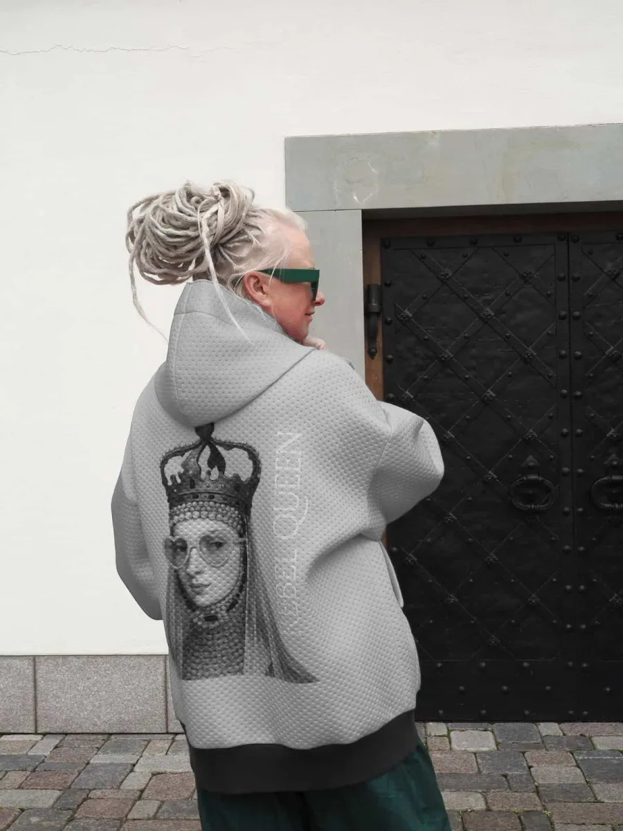 Grey “Rebel Queen” hoodie with the queen's image on the back, worn by a woman