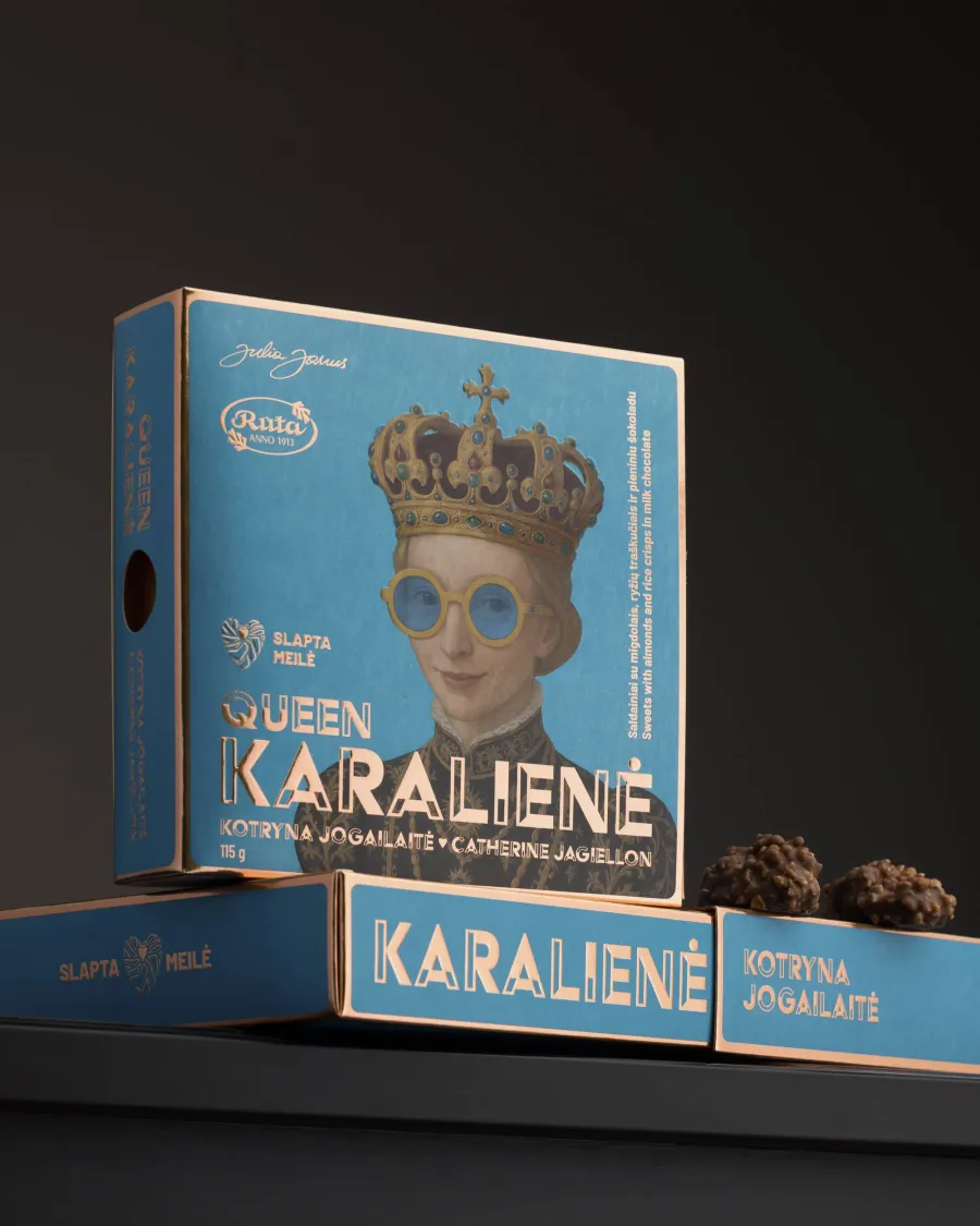 Blue “Queen Karalienė” chocolate box with a portrait of Catherine Jagiellon on a dark background