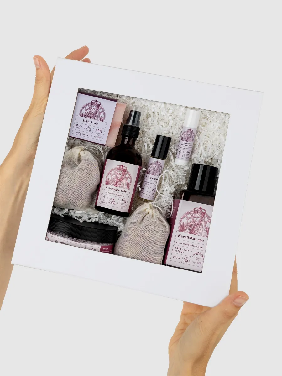 “Renaissance Rose” rose SPA gift set in a white box with a window, held in hands